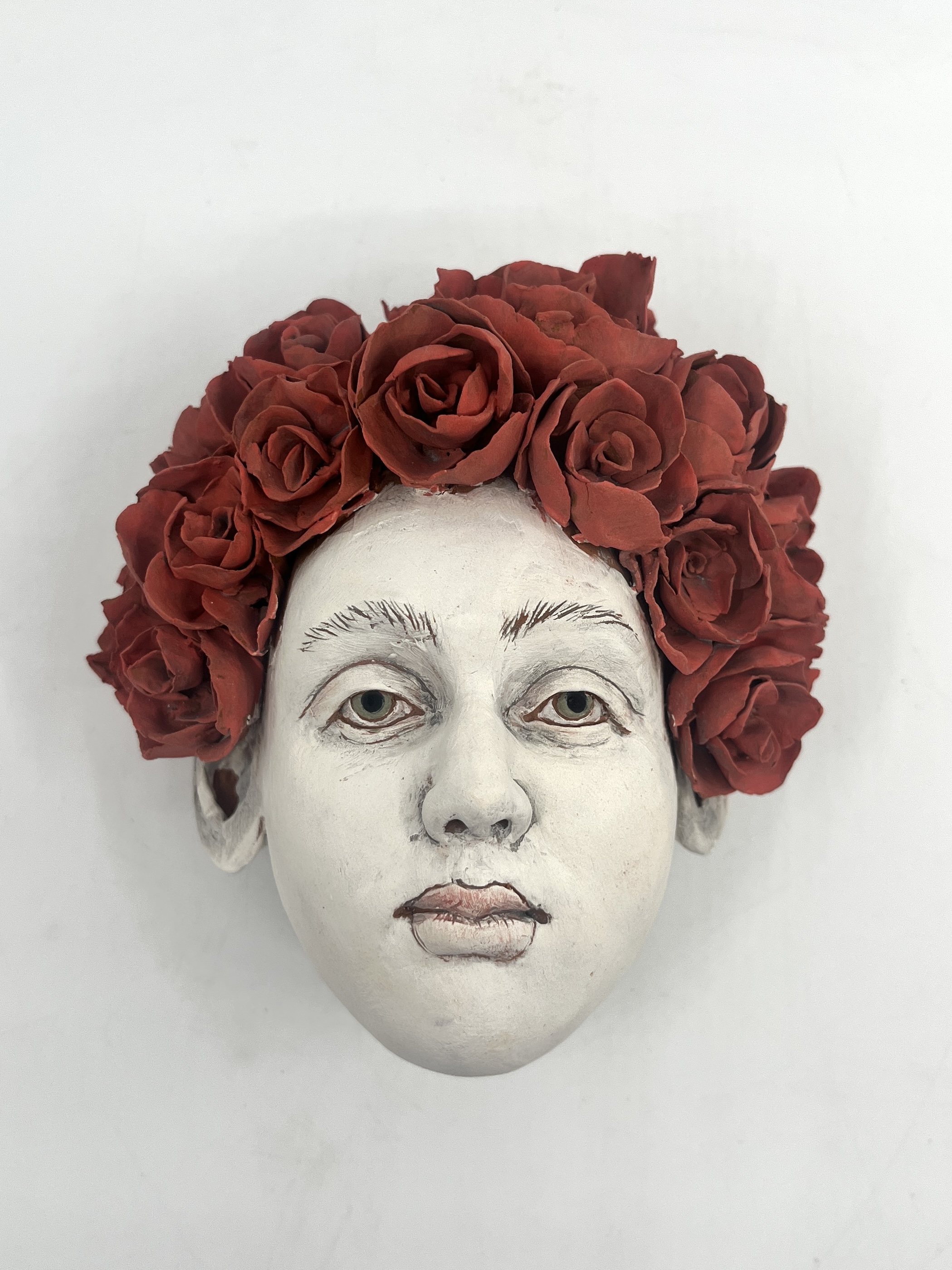 American beauty, head with roses