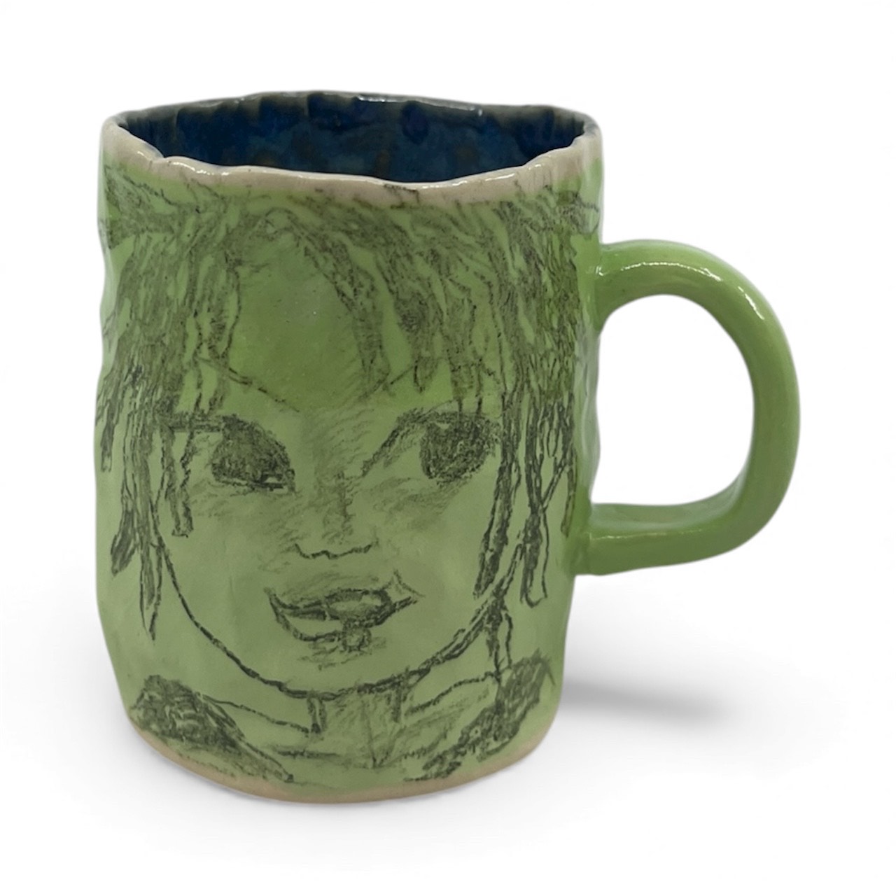 Green pinched mug, mid fire