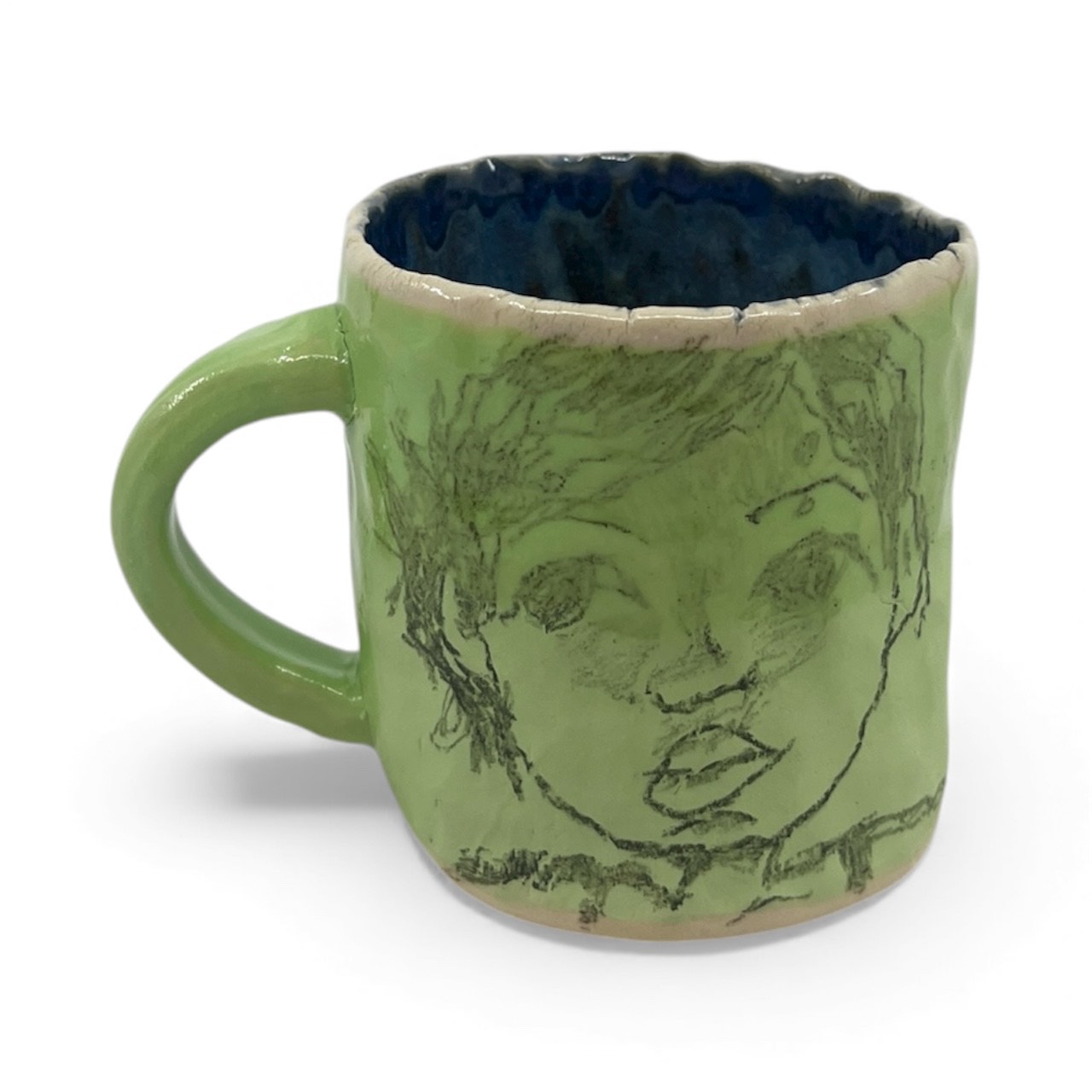 Green pinched mug, mid fire
