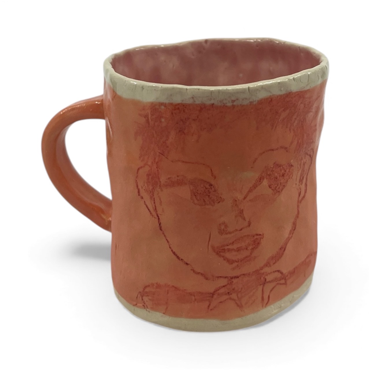 Orange pinched mug, mid fire